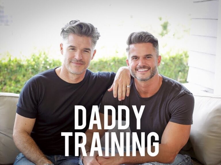 Eric Rutherford sitting with Matthew Dempsey; Text: Daddy Training