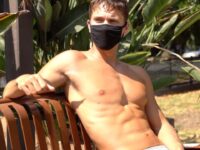 Dr Andrew Neighbor shirtless with mask